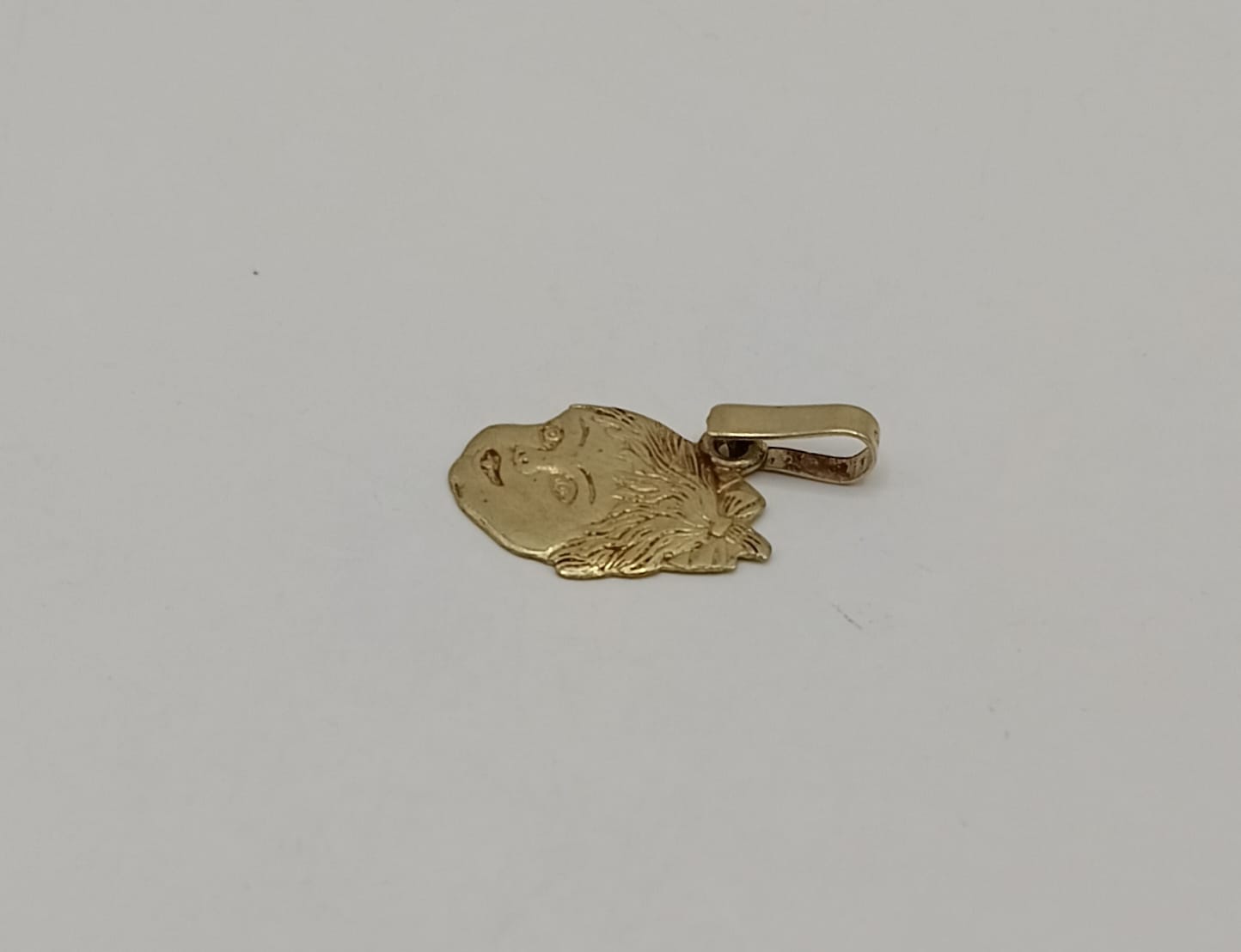 Dije de niña ORO 10k peso 1gr, usado
