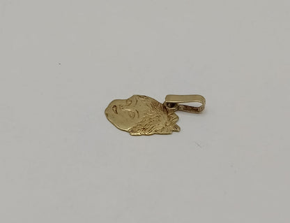 Dije de niña ORO 10k peso 1gr, usado