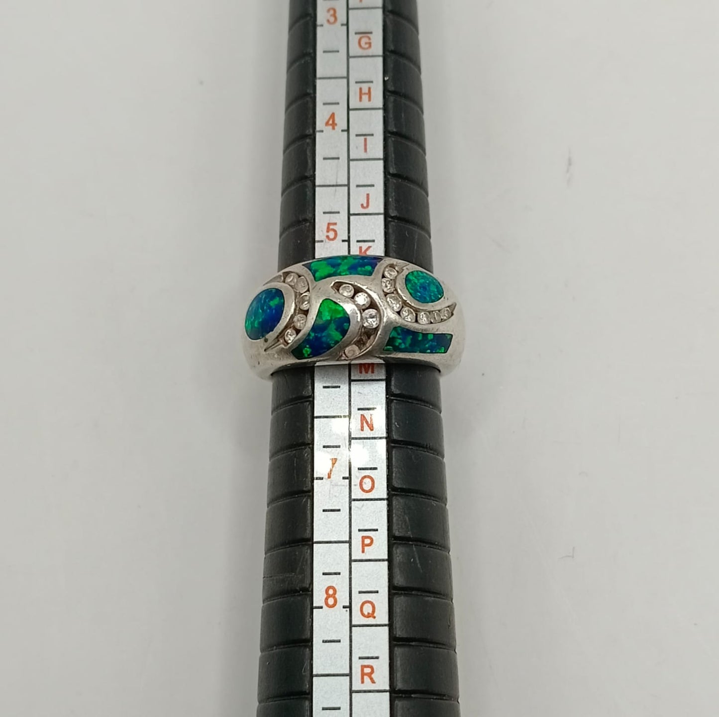 Anillo con sinteticos PLATA 925 peso 7.7gr, usado