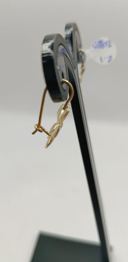 Par aretes flor ORO 10k peso 2.1gr, usado