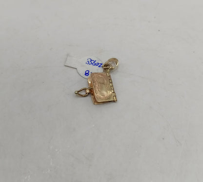 Dije de libro ORO 10k peso 1.8gr, usado