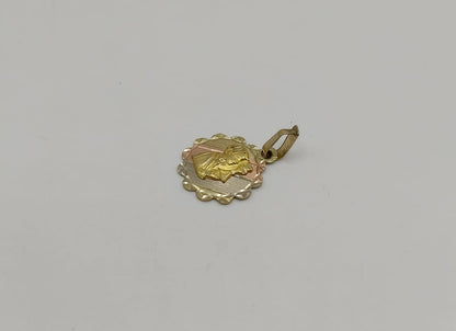 Medalla religiosa ORO 10k peso 1.5gr, usado