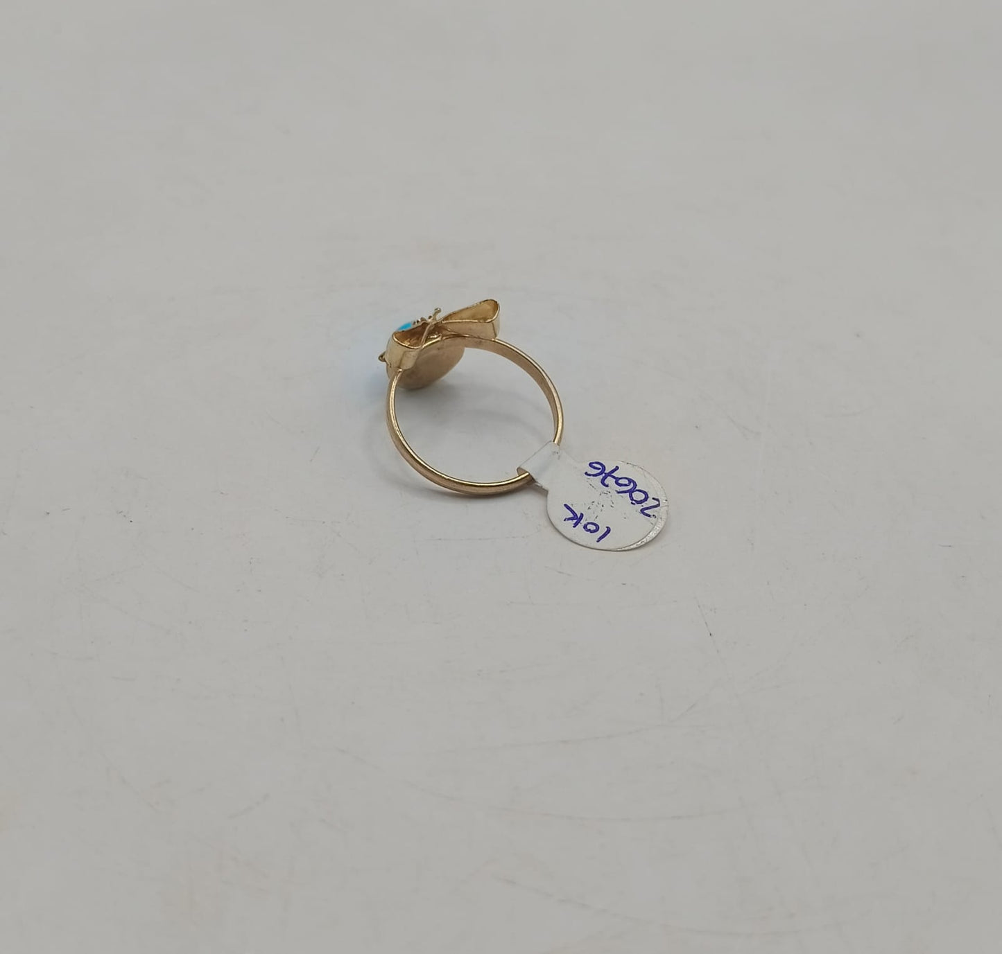 Arete moño ojo de gato azul ORO10k peso 1.8gr, usado