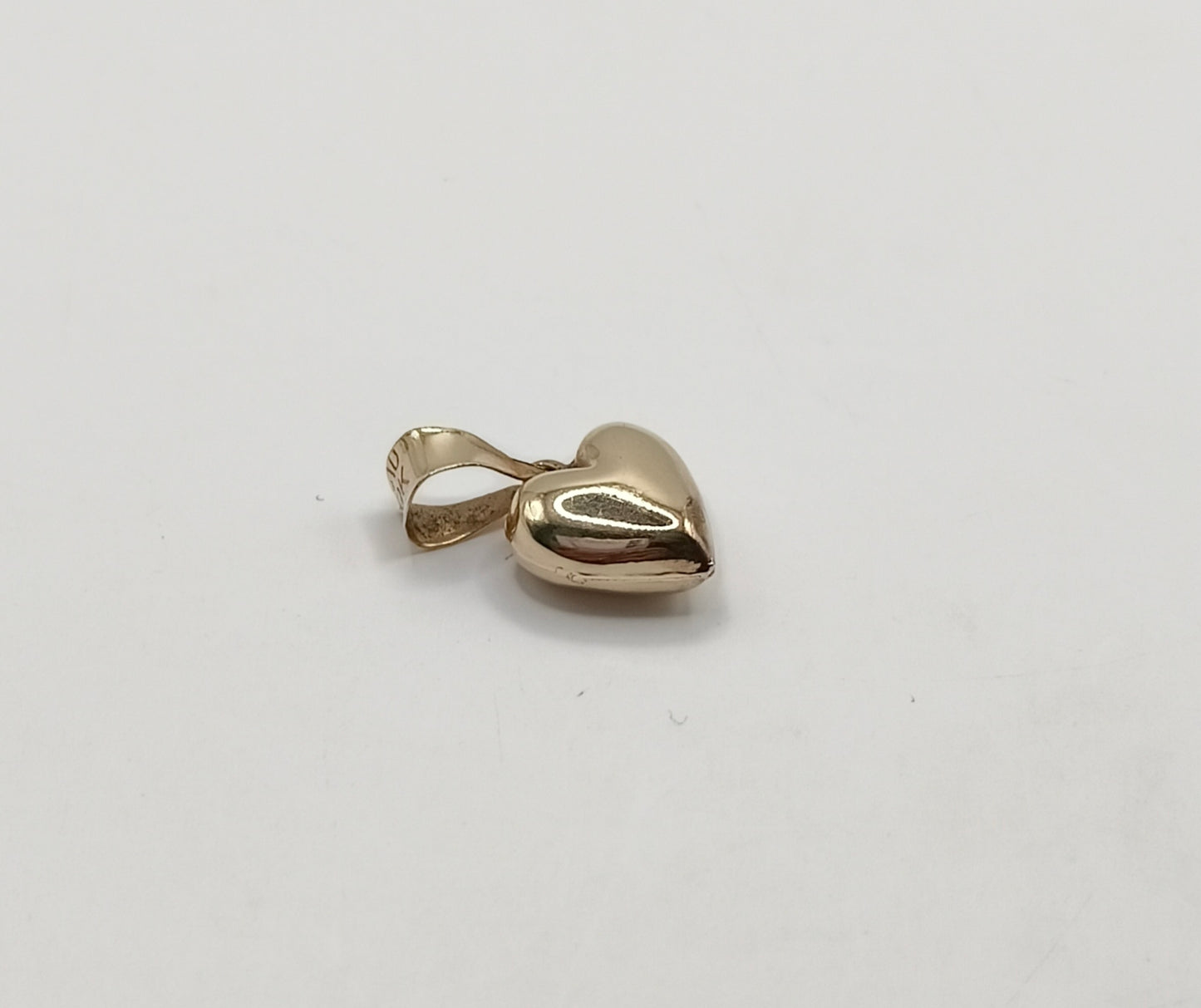 Dije de corazon ORO 10k peso .8gr, usado