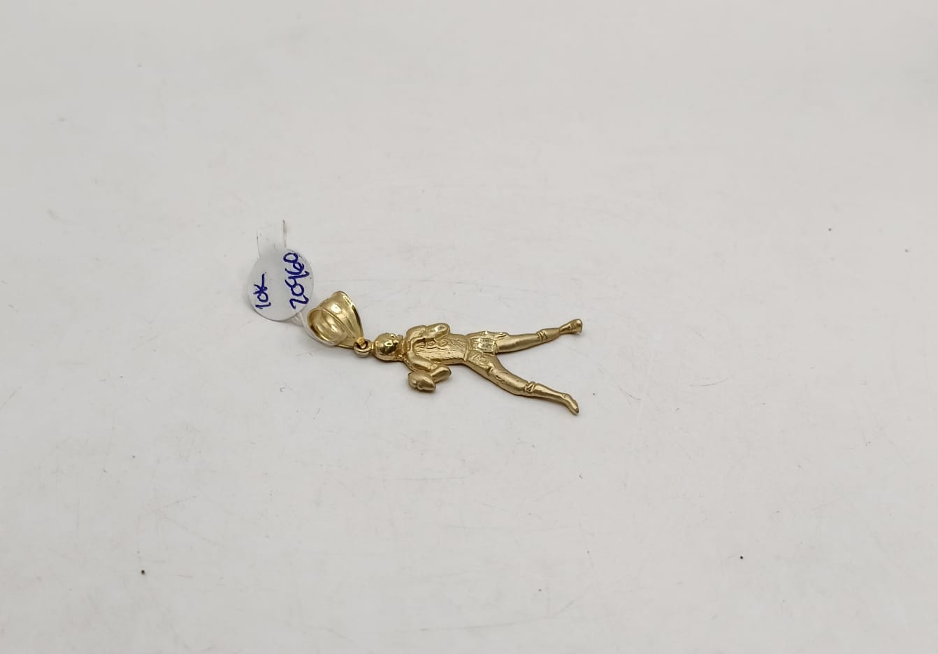 Dije de jugador ORO 10k peso 3.3gr, usado
