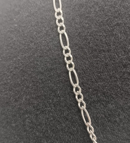 Cadena 3x1 y dije de santa PLATA 925 peso 30.9gr, usado